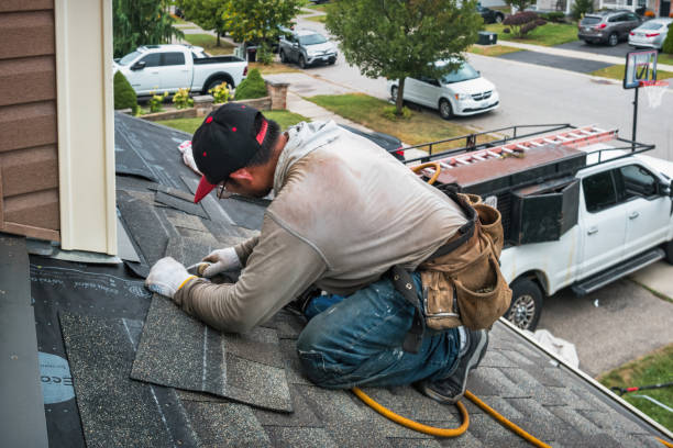 Professional Gutter Repair And Installation technician working in Girard, OH